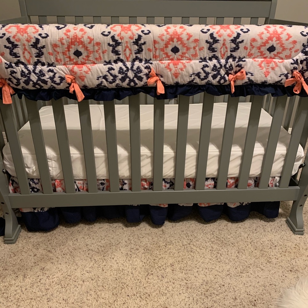 Crib rail cover and skirt (crib not for sale)